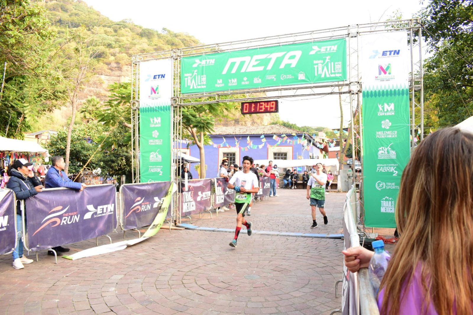 1667824034 583 Llegando participantes de la carrera atletica de 6km en sus